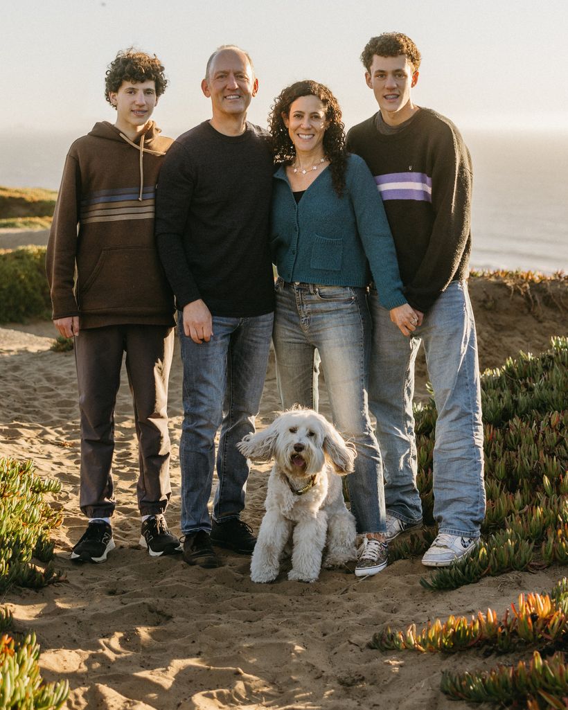 Brian Sutherland with his family on a Marin beach at sunset